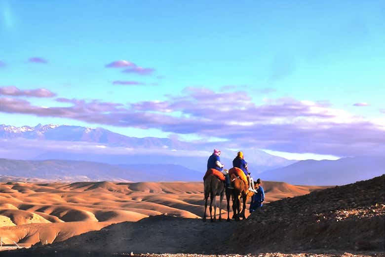 Ride a camel over the sand dunes